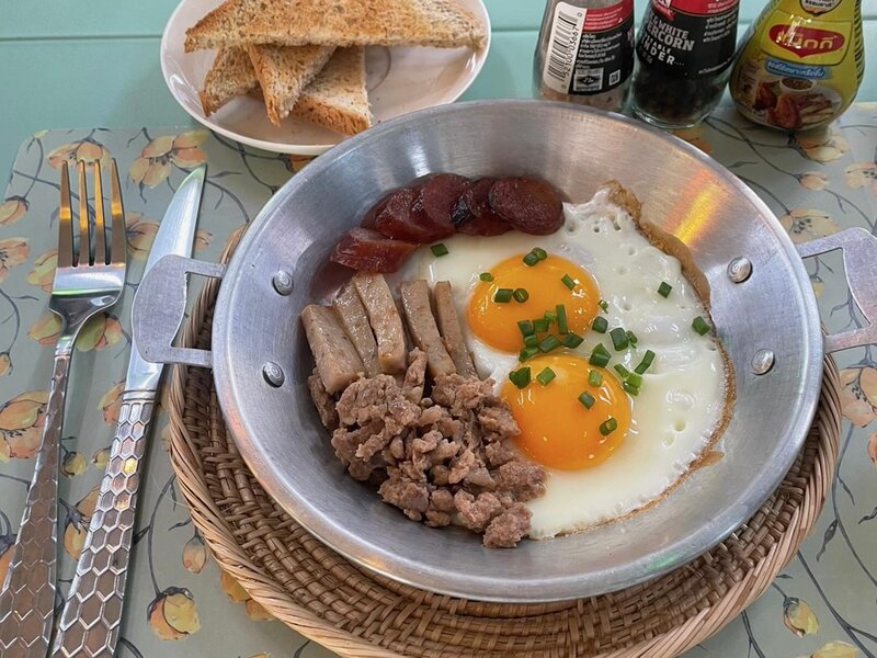 Khai Katha · Vietnamese breakfast pan with eggs, sausage and toast